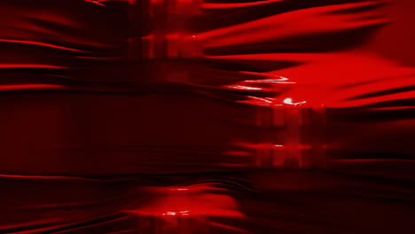 Red-color-textile-fabric-seamless-looping-background-moving-slowly